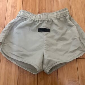 Green Fear of God Essentials shorts